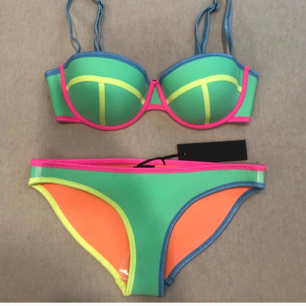ISO a Triangl top and bottoms I need a small pair of bottoms and a medium top